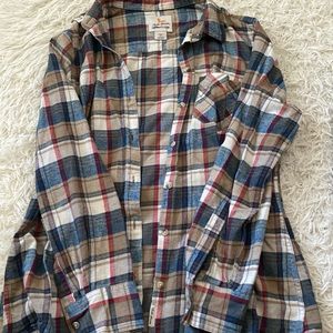 Woman’s large plaid flannel button up
